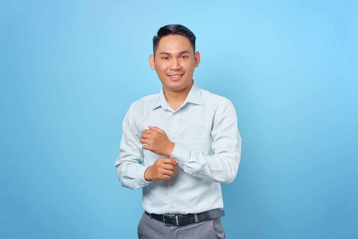 Confident young person in a striking one-of-a-kind formal outfit at an evening event