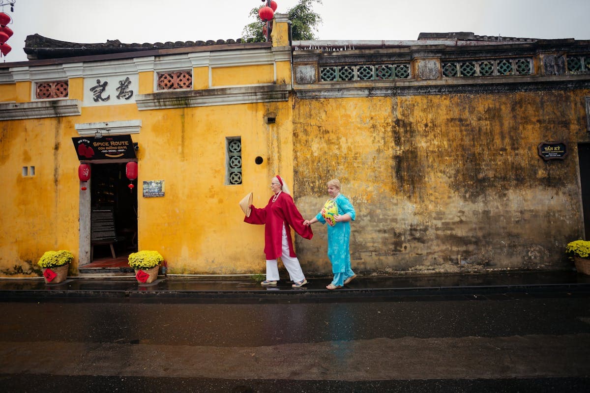 Lantern-lined heritage street in Hoi An Ancient Town, Vietnam, where the tailor workshops are located