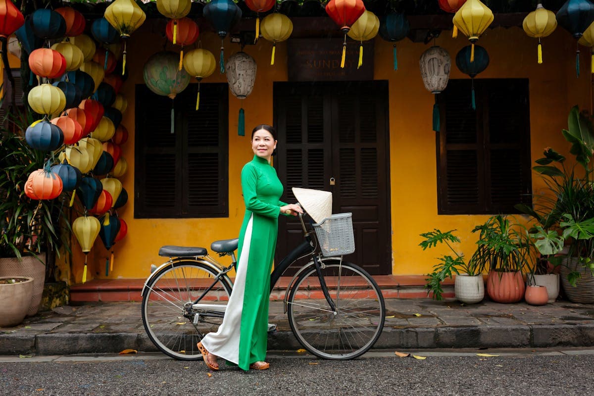 Iconic yellow walls and lanterns of Hoi An Ancient Town, a favorite backdrop for family group photos