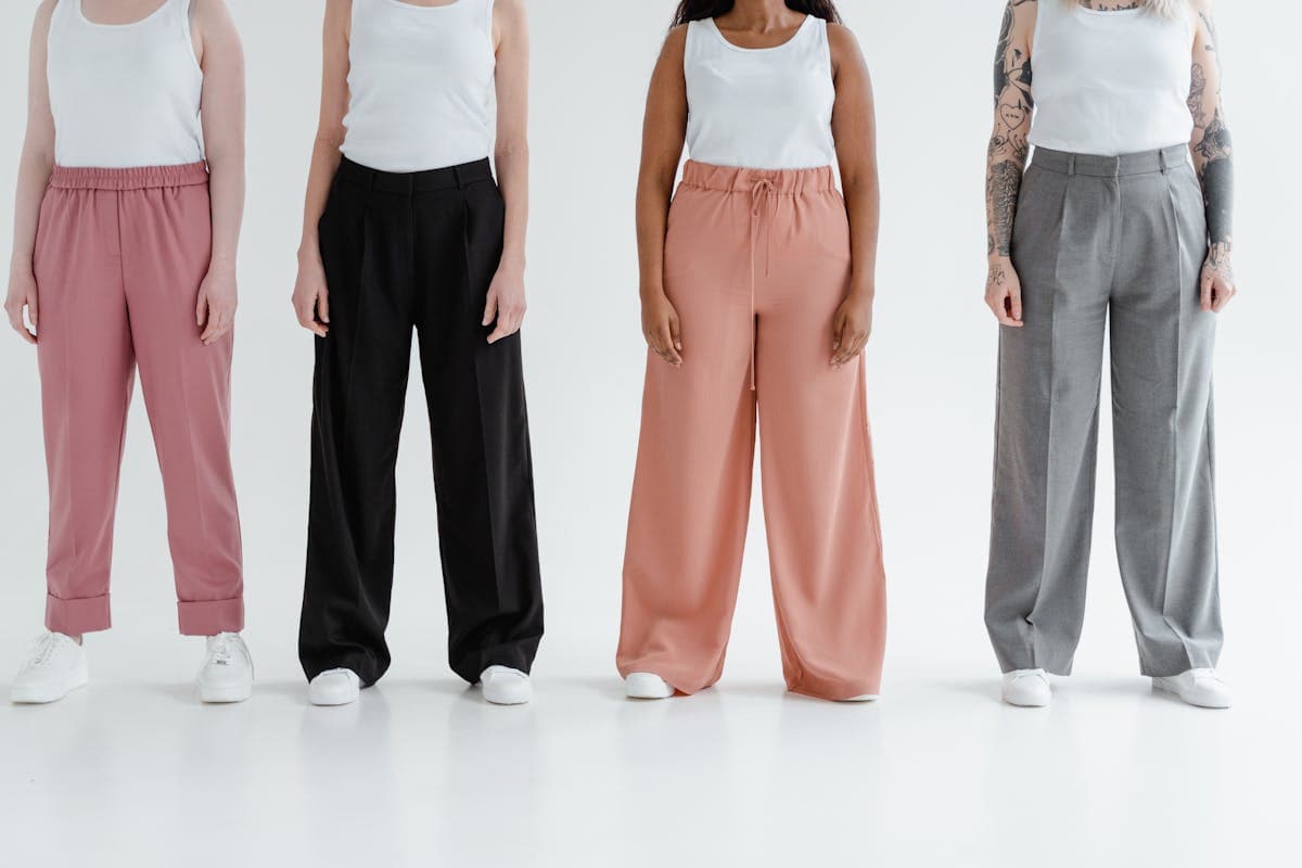 Wide-leg high-waisted trousers showing structured fullness and drape, illustrating the proportion-driven disco silhouette