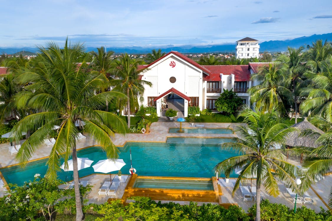 Tropical pool and lush garden at a wellness resort in central Vietnam near Hoi An