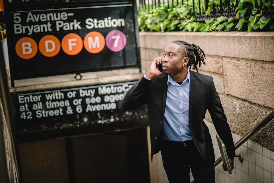 Young professional man in a well-fitted custom suit walking through Manhattan