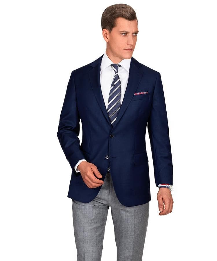 Oliver Wicks navy pick and pick made-to-measure blazer photographed on a plain studio background