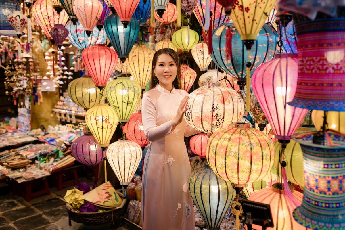 Quiet early morning street in Hoi An, Vietnam with traditional lanterns and warm light -- 8,500 miles from a Manhattan trading floor