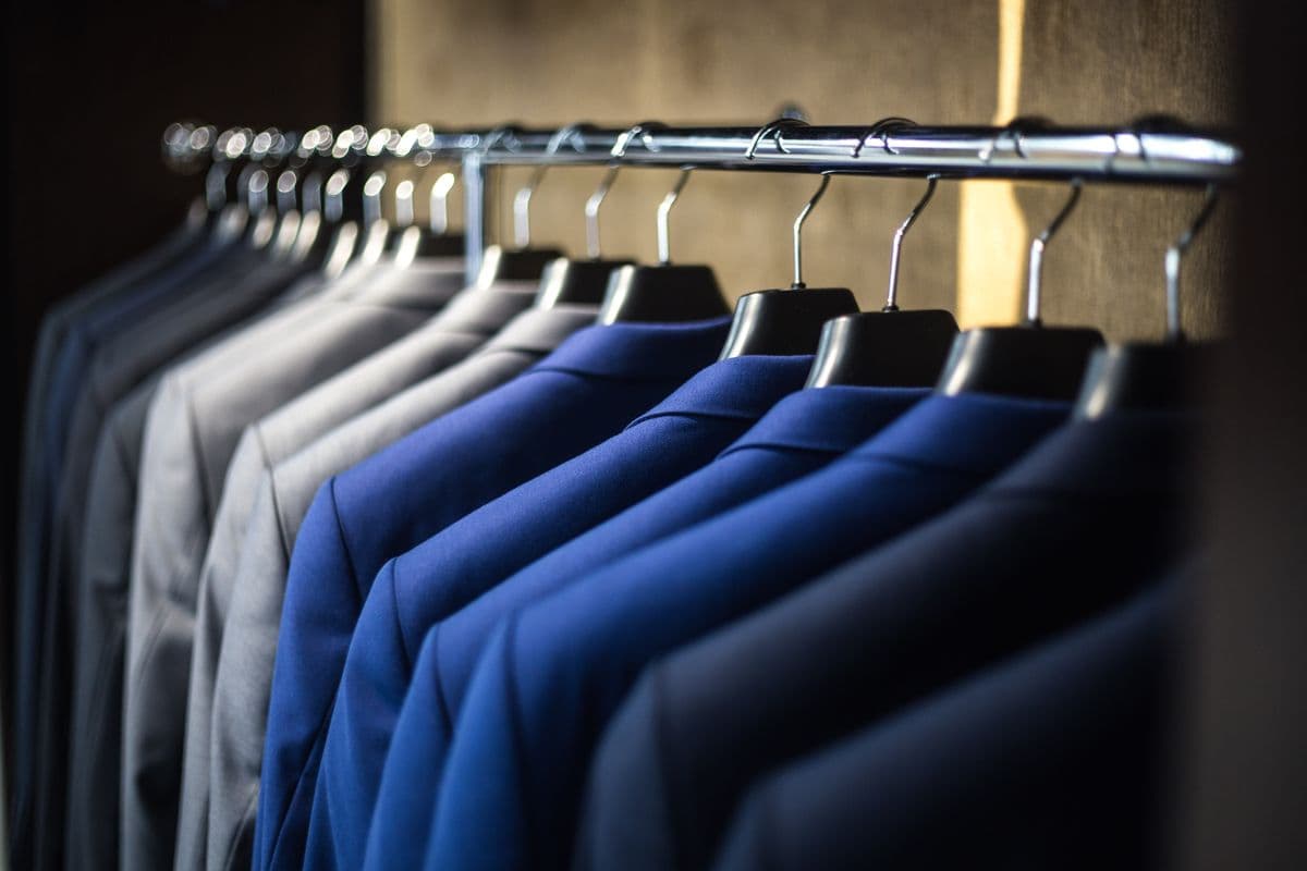 Who Owns Which Suit Brand? Men's Wearhouse, Jos. A. Bank, Brooks Brothers and 15 More (2026) — bespoke suits and custom tailored suits by Nathan Tailors, the Hoi An custom tailor