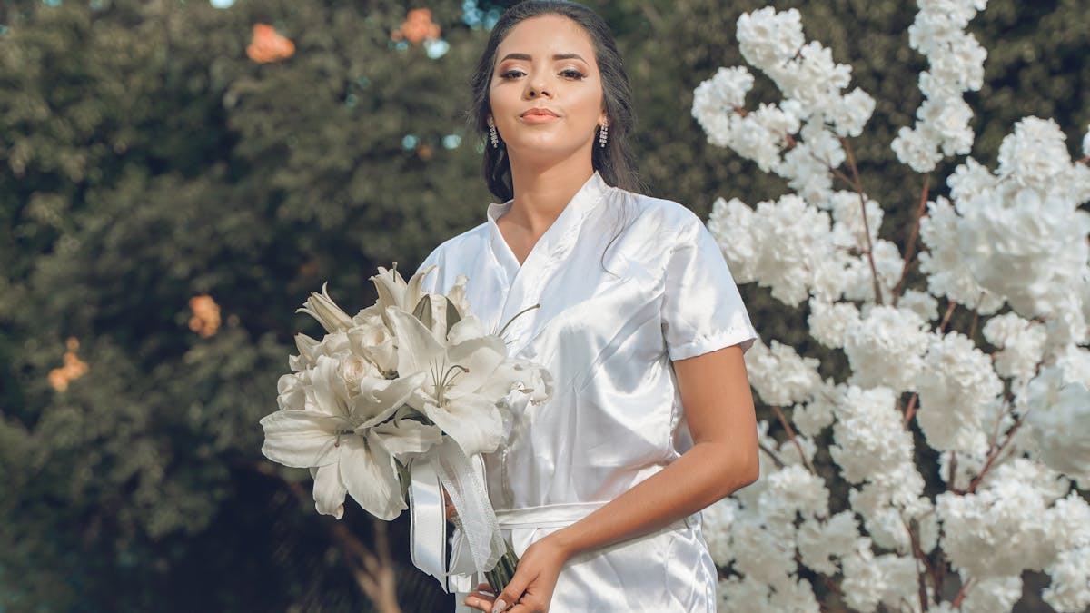 Minimalist bias-cut silk slip wedding dress in the style of the iconic CBK gown