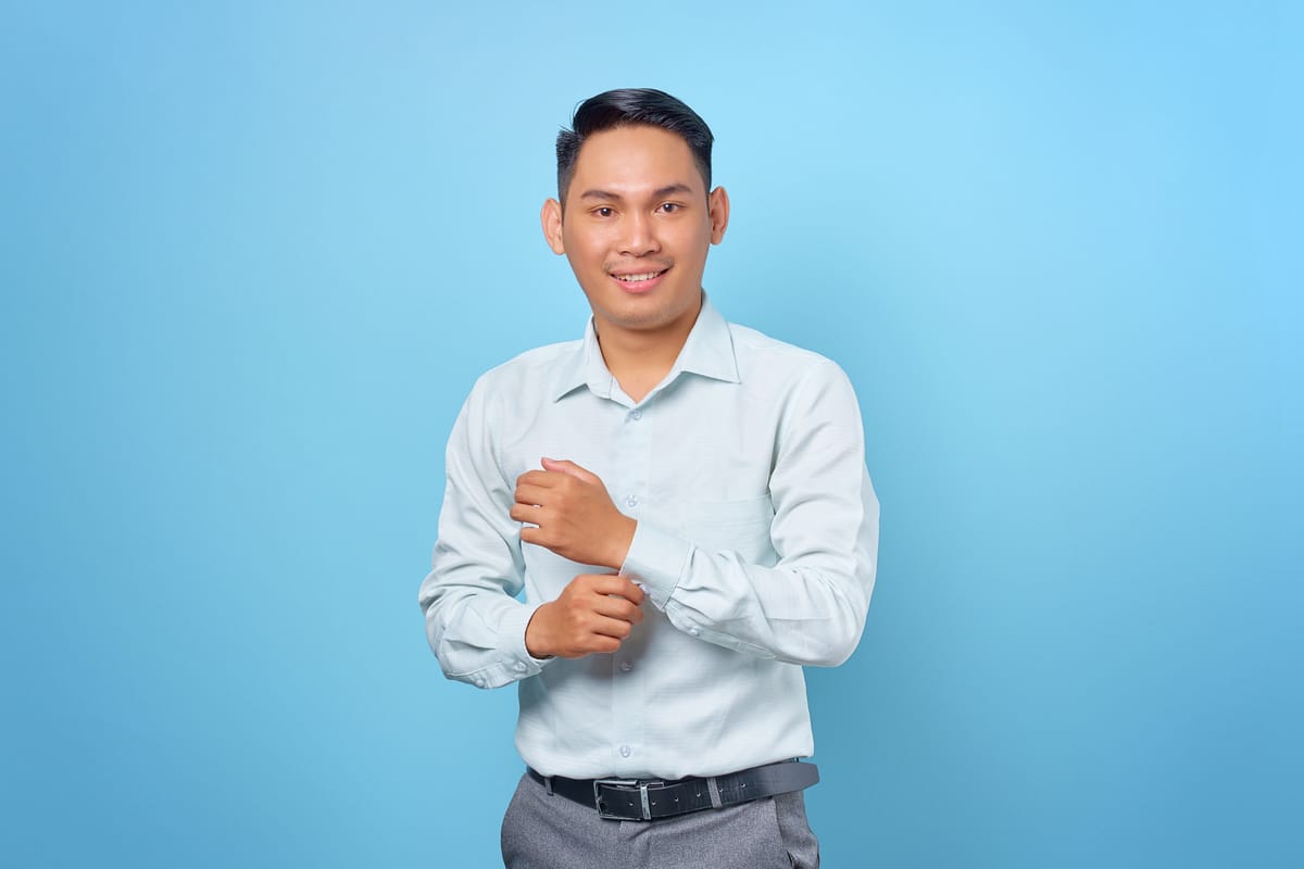 Confident young person in a striking one-of-a-kind formal outfit at an evening event