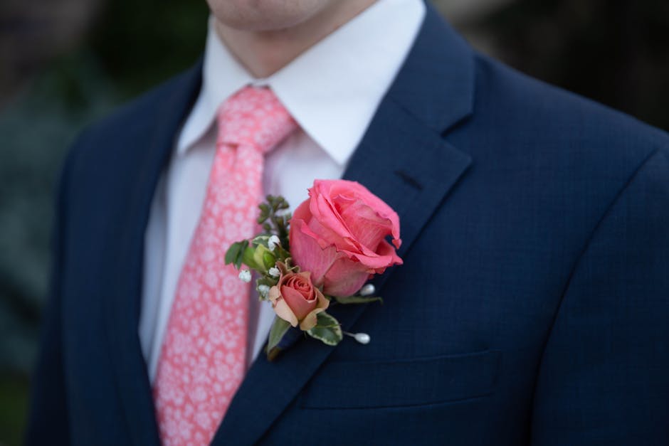 Groomsmen in coordinated matching suits standing together