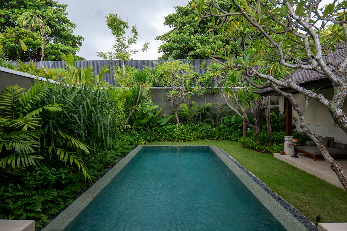 A private villa with a swimming pool and garden, the kind large families rent in Hoi An