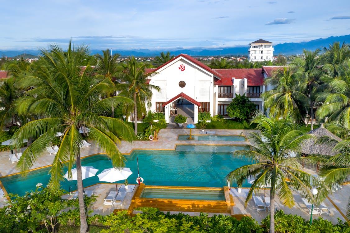 Tropical pool and lush garden at a wellness resort in central Vietnam near Hoi An